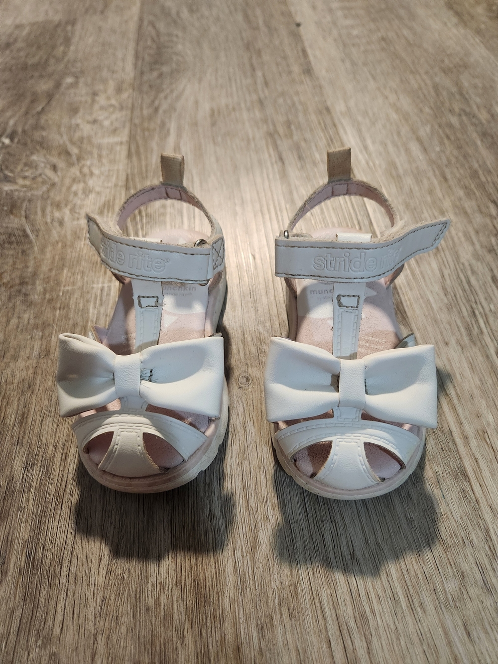 Munchkin White T-Strap Sandals with Bow Accent